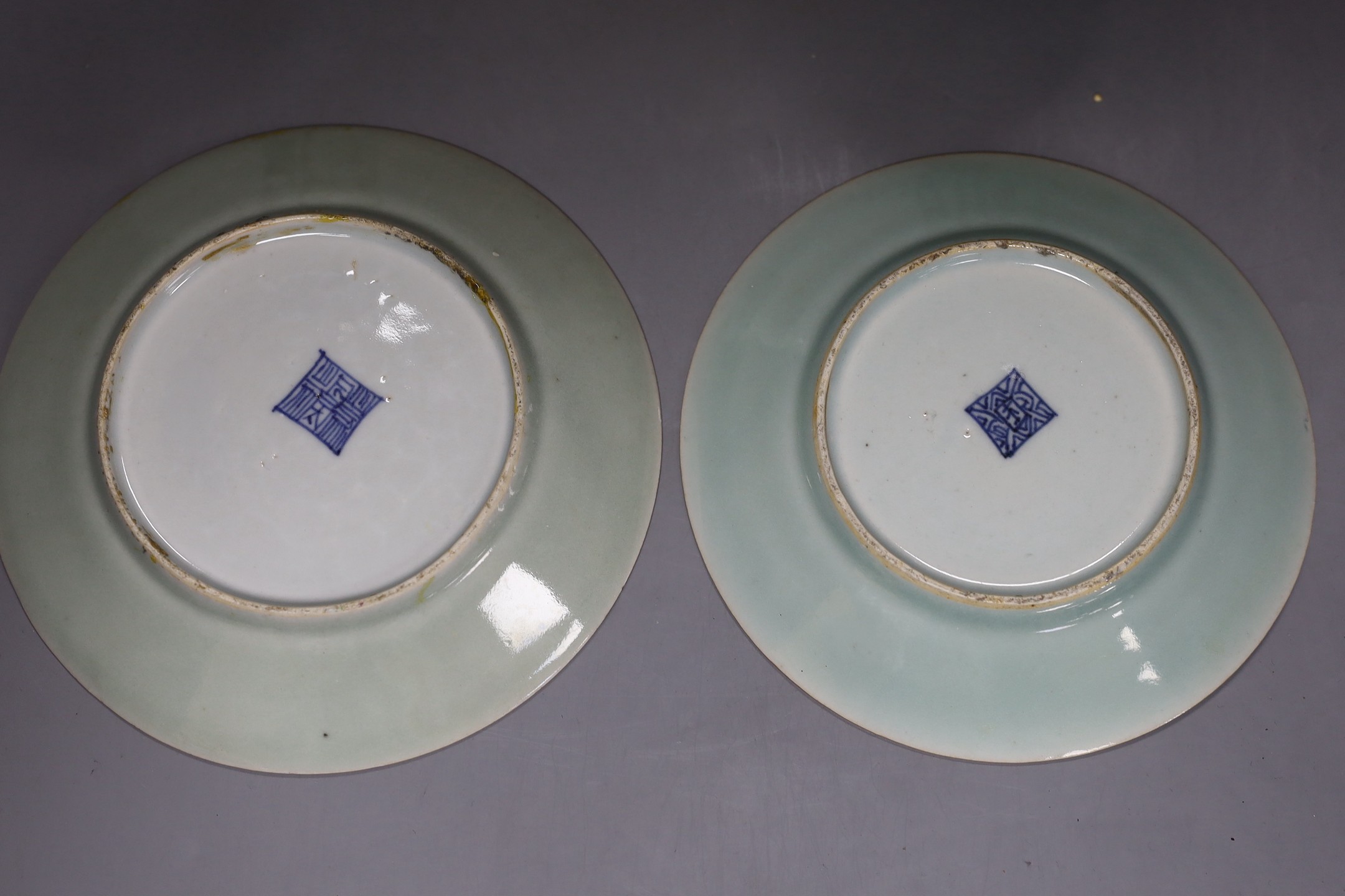 Three Chinese famille rose celadon ground plates and a pair of Japanese celadon ground vases